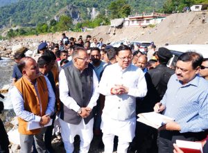 Dhami celebrates Diwali among Doon’s disaster affected families