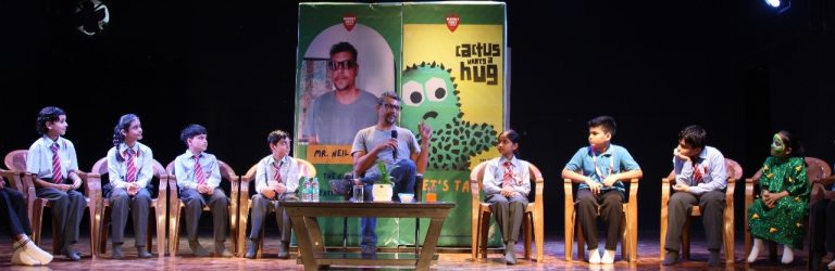 Writer Neil Flory interacts with students of Mount Ford Academy