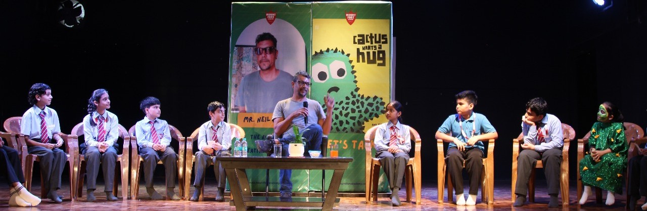 Writer Neil Flory interacts with students of Mount Ford Academy