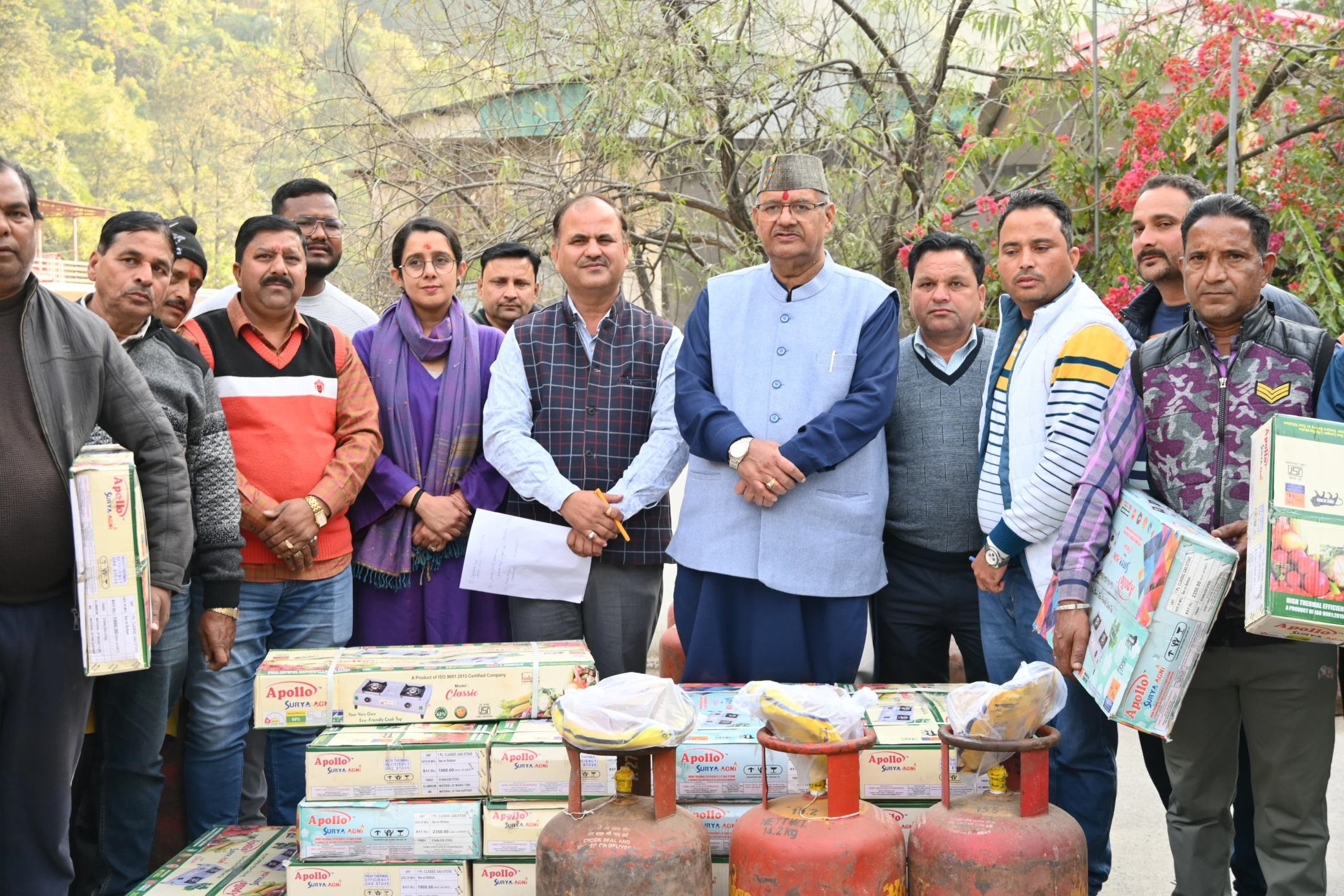 Minister Joshi distributes gas stoves with cylinders as relief to disaster struck at Sahastradhara