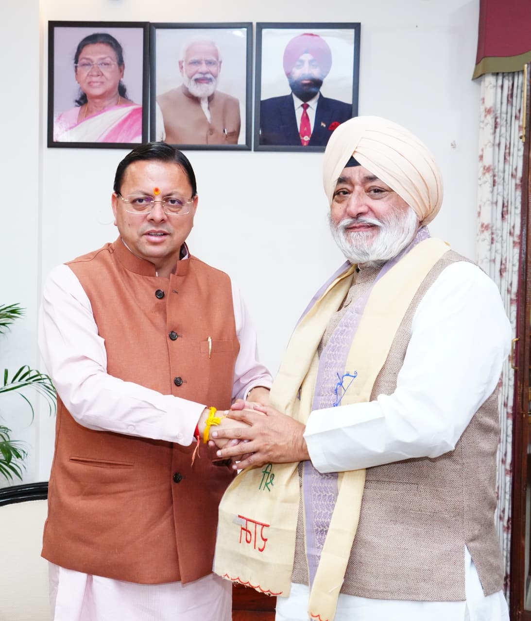 Bindra calls on Dhami, invites him to flag off first