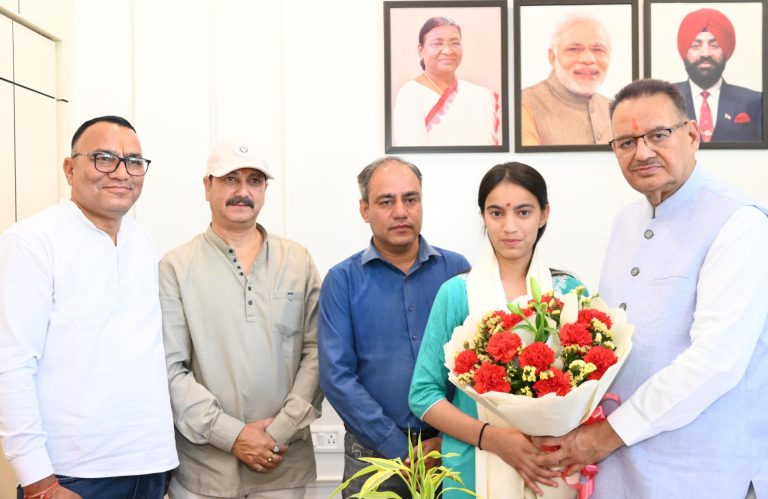 Minister Ganesh Joshi honors girl student