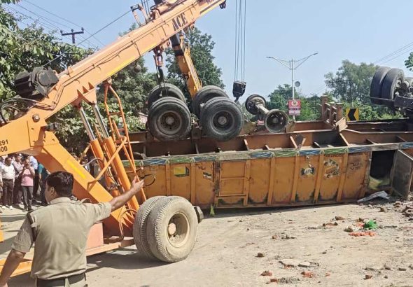 Biker killed, two injured as truck overturns in Mohabbewala
